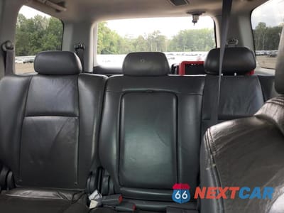 Zdjęcie 10 z 13 samochodu: 2004 HONDA PILOT EXL VIN:2HKYF18794H532770 - miniatura