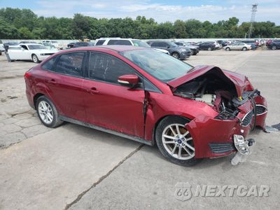 Czwarte zdjęcie samochodu z boku: 2017 FORD FOCUS SE VIN:1FADP3F27HL209260 - miniatura