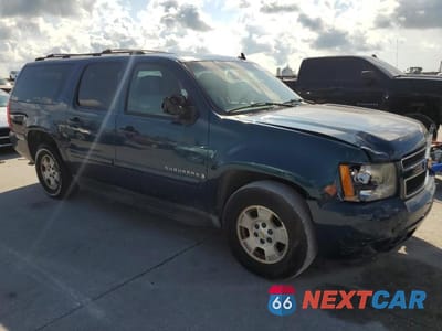 Czwarte zdjęcie samochodu z boku: 2007 CHEVROLET SUBURBAN C1500 VIN:1GNFC16J07R212711 - miniatura