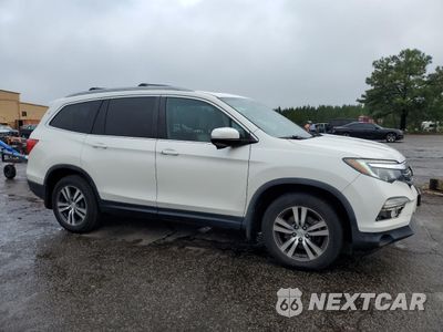 Czwarte zdjęcie samochodu z boku: 2018 HONDA PILOT EXLN VIN:5FNYF5H70JB007310 - miniatura