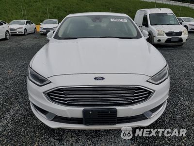 Piąte zdjęcie samochodu w środku: 2018 FORD FUSION SE HYBRID VIN:3FA6P0LU1JR171917 - miniatura