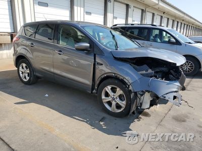 Czwarte zdjęcie samochodu z boku: 2014 FORD ESCAPE SE VIN:1FMCU0GX3EUE09254 - miniatura