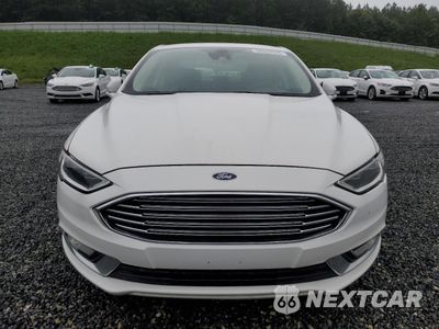 Piąte zdjęcie samochodu w środku: 2017 FORD FUSION SE HYBRID VIN:3FA6P0LU5HR410086 - miniatura