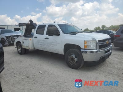 Czwarte zdjęcie samochodu z boku: 2012 FORD F550 SUPER DUTY VIN:1FDUF5GTXCEA99135 - miniatura