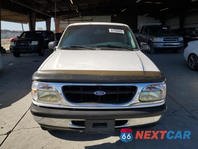 Piąte zdjęcie samochodu w środku: 1996 FORD EXPLORER VIN:1FMDU34X2TZA58721 - miniatura