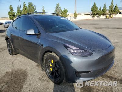 Czwarte zdjęcie samochodu z boku: 2023 TESLA MODEL Y VIN:7SAYGDEE7PA067247 - miniatura
