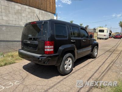 Czwarte zdjęcie samochodu z boku: 2012 JEEP LIBERTY SPORT VIN:1C4PJMAK8CW190070 - miniatura