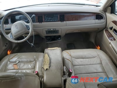 Zdjęcie 8 z 15 samochodu: 2000 LINCOLN TOWN CAR EXECUTIVE VIN:1LNHM81W0YY784410 - miniatura