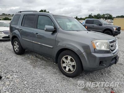 Czwarte zdjęcie samochodu z boku: 2011 HONDA PILOT TOURING VIN:5FNYF4H95BB019725 - miniatura
