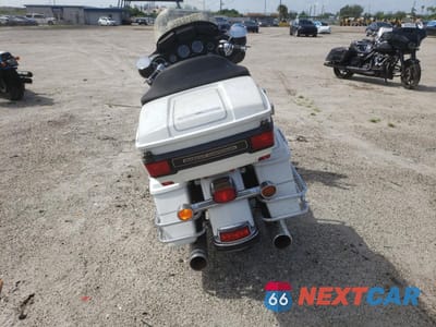 Czwarte zdjęcie samochodu z boku: 2012 HARLEY-DAVIDSON FLHTCU ULTRA CLASSIC ELECTRA GLIDE VIN:1HD1FCM19CB681032 - miniatura