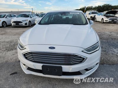 Piąte zdjęcie samochodu w środku: 2017 FORD FUSION SE HYBRID VIN:3FA6P0LU7HR409408 - miniatura