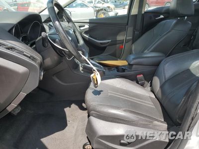 Zdjęcie 7 z 15 samochodu: 2013 FORD FOCUS TITANIUM VIN:1FADP3J2XDL270510 - miniatura