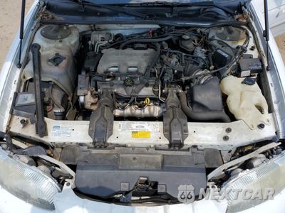 Zdjęcie 11 z 13 samochodu: 1996 CHEVROLET LUMINA VIN:2G1WL52M7T1204424 - miniatura