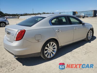 Trzecie zdjęcie samochodu z tyłu: 2009 LINCOLN MKS VIN:1LNHM94R89G616002 - miniatura