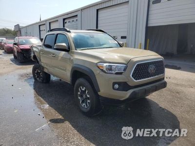 Czwarte zdjęcie samochodu z boku: 2018 TOYOTA TACOMA DOUBLE CAB VIN:5TFCZ5AN1JX157989 - miniatura