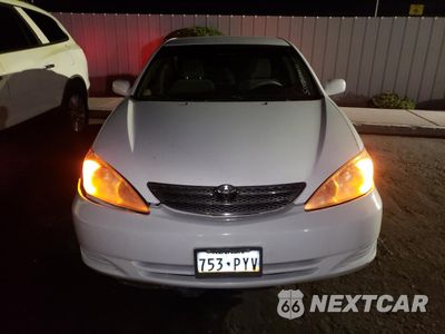 Piąte zdjęcie samochodu w środku: 2003 TOYOTA CAMRY LE VIN:4T1BE32K43U154133 - miniatura