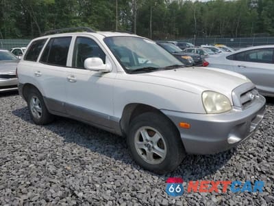 Czwarte zdjęcie samochodu z boku: 2003 HYUNDAI SANTA FE GLS VIN:KM8SC13D63U508602 - miniatura