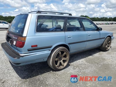 Trzecie zdjęcie samochodu z tyłu: 1991 TOYOTA CAMRY DLX VIN:JT2SV21W9M0379281 - miniatura