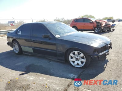 Czwarte zdjęcie samochodu z boku: 1995 BMW 325 I VIN:WBACB3329SFE22404 - miniatura