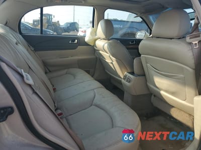 Zdjęcie 10 z 14 samochodu: 2002 LINCOLN CONTINENTAL VIN:1LNHM97V42Y619021 - miniatura