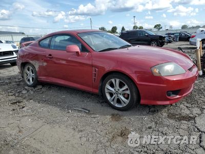 Czwarte zdjęcie samochodu z boku: 2005 HYUNDAI TIBURON GT VIN:KMHHN65F25U160235 - miniatura