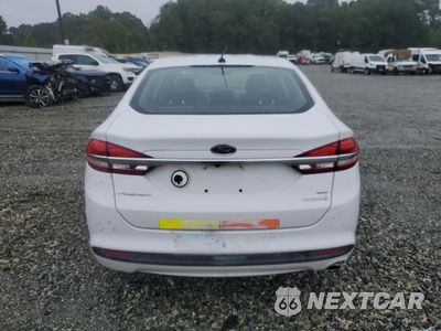 Zdjęcie 6 z 12 samochodu: 2017 FORD FUSION SE HYBRID VIN:3FA6P0LUXHR359684 - miniatura