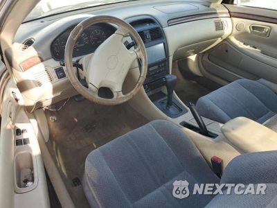 Zdjęcie 8 z 12 samochodu: 2001 TOYOTA CAMRY SOLARA SE VIN:2T1CF22P71C443559 - miniatura