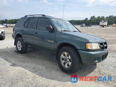 Czwarte zdjęcie samochodu z boku: 2004 ISUZU RODEO S VIN:4S2CK58Y044305208 - miniatura