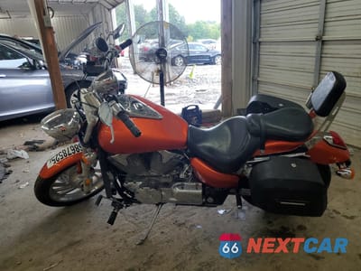 Trzecie zdjęcie samochodu z tyłu: 2006 HONDA VTX1300 C VIN:1HFSC55026A214910 - miniatura