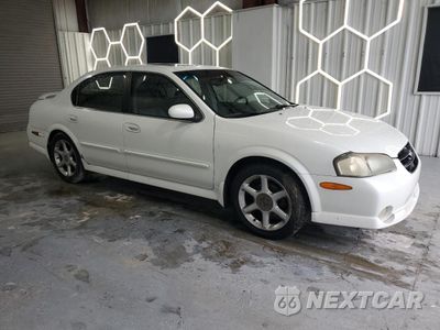 Czwarte zdjęcie samochodu z boku: 2001 NISSAN MAXIMA GXE VIN:JN1CA31A71T306585 - miniatura