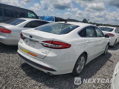 Trzecie zdjęcie samochodu z tyłu: 2018 FORD FUSION SE HYBRID VIN:3FA6P0LU2JR171943 - miniatura