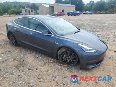 Czwarte zdjęcie samochodu z boku: 2020 TESLA MODEL 3 VIN:5YJ3E1EB9LF636646 - miniatura
