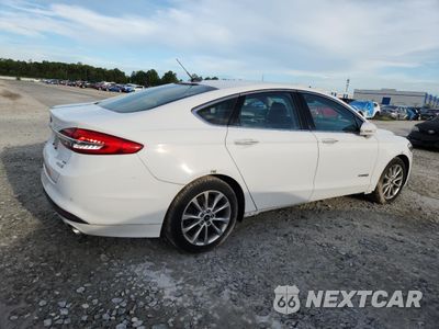Trzecie zdjęcie samochodu z tyłu: 2017 FORD FUSION SE HYBRID VIN:3FA6P0LU9HR409572 - miniatura