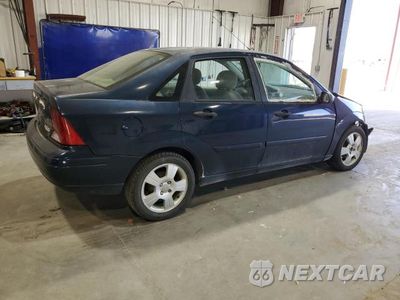 Trzecie zdjęcie samochodu z tyłu: 2003 FORD FOCUS SE COMFORT VIN:1FAFP34Z43W321353 - miniatura