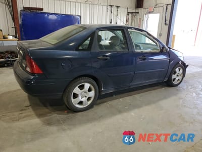 Trzecie zdjęcie samochodu z tyłu: 2003 FORD FOCUS SE COMFORT VIN:1FAFP34Z43W321353 - miniatura