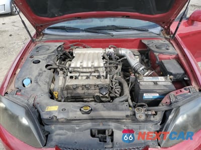 Zdjęcie 11 z 12 samochodu: 2005 HYUNDAI TIBURON GT VIN:KMHHN65F25U160235 - miniatura