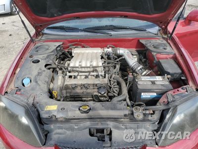 Zdjęcie 11 z 12 samochodu: 2005 HYUNDAI TIBURON GT VIN:KMHHN65F25U160235 - miniatura