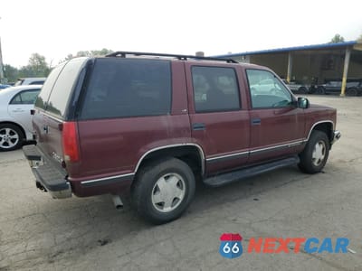 Trzecie zdjęcie samochodu z tyłu: 1999 CHEVROLET TAHOE K1500 VIN:1GNEK13RXXJ430856 - miniatura