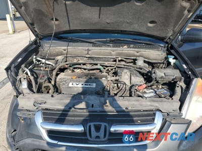 Zdjęcie 12 z 13 samochodu: 2004 HONDA CR-V LX VIN:JHLRD68484C001989 - miniatura