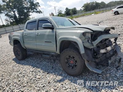 Czwarte zdjęcie samochodu z boku: 2023 TOYOTA TACOMA DOUBLE CAB VIN:3TMCZ5AN9PM569768 - miniatura