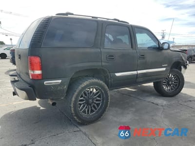 Trzecie zdjęcie samochodu z tyłu: 2000 GMC YUKON VIN:1GKEC13T2YJ127996 - miniatura