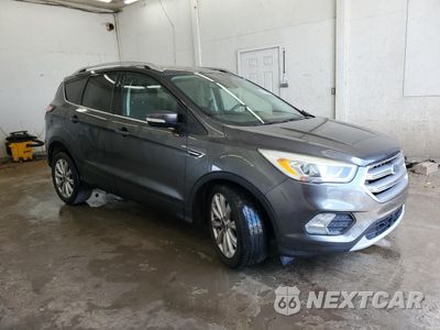 Czwarte zdjęcie samochodu z boku: 2017 FORD ESCAPE TITANIUM VIN:1FMCU0J98HUD34176 - miniatura
