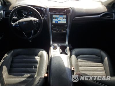 Zdjęcie 8 z 12 samochodu: 2017 FORD FUSION SE HYBRID VIN:3FA6P0LU5HR409133 - miniatura
