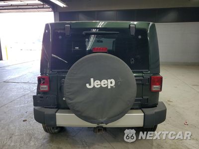 Zdjęcie 6 z 13 samochodu: 2011 JEEP WRANGLER UNLIMITED SAHARA VIN:1J4HA5H12BL516222 - miniatura