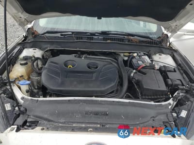 Zdjęcie 11 z 12 samochodu: 2014 FORD FUSION TITANIUM VIN:3FA6P0K92ER118775 - miniatura