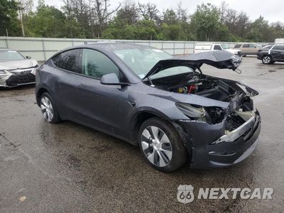 Czwarte zdjęcie samochodu z boku: 2023 TESLA MODEL Y VIN:7SAYGDEDXPF940578 - miniatura