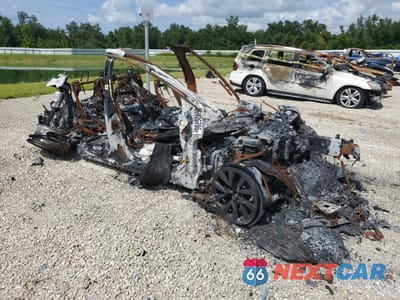 Czwarte zdjęcie samochodu z boku: 2022 TESLA MODEL X VIN:7SAXCAE59NF340422 - miniatura