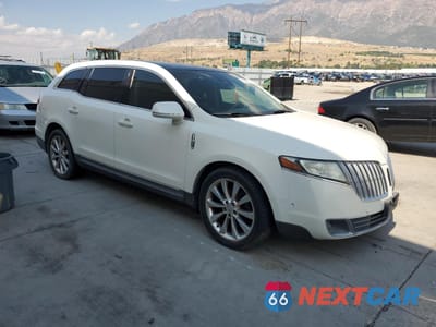 Czwarte zdjęcie samochodu z boku: 2012 LINCOLN MKT VIN:2LMHJ5AT9CBL53684 - miniatura