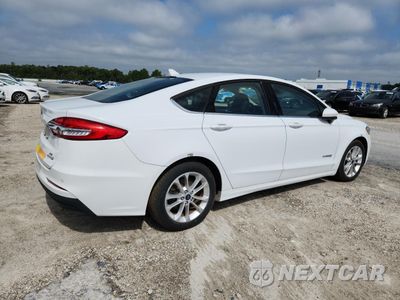 Trzecie zdjęcie samochodu z tyłu: 2019 FORD FUSION SE VIN:3FA6P0LU4KR285119 - miniatura