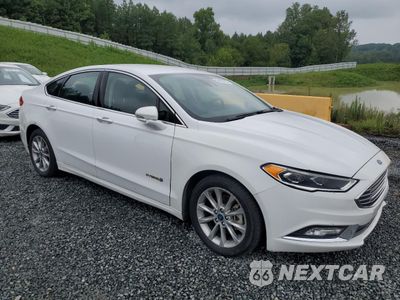 Czwarte zdjęcie samochodu z boku: 2017 FORD FUSION SE HYBRID VIN:3FA6P0LU4HR410032 - miniatura